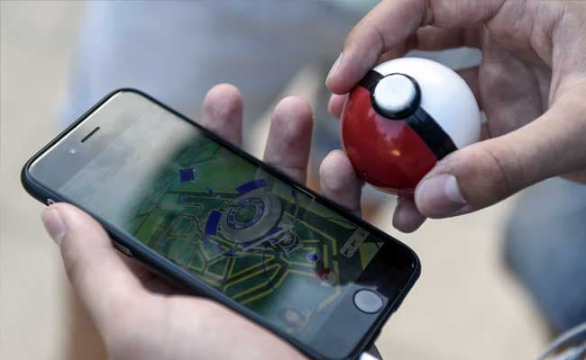 Playing the game has also helped people discover new experiences and areas. (AFP Photo)