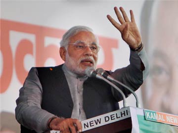 Narendra Modi lashes out at Manmohan Singh, P Chidambaram at Delhi rally Narendra Modi lashes out at Manmohan Singh, P Chidambaram at Delhi rally