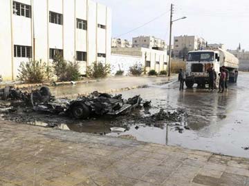 Bomb attacks kill at least 18 in Iraq Bomb attacks kill at least 18 in Iraq
