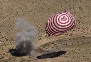 Chinese astronauts parachute land after mission 