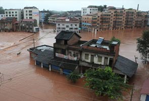 Rain storms kill at least 37 in Beijing