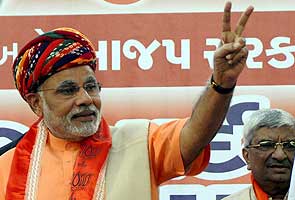 Narendra Modi to be sworn in as Chief Minister on December 26 Narendra Modi to be sworn in as Chief Minister on December 26