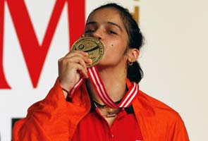 Kiran Kumar Reddy congratulates Saina for winning Indonesia Open