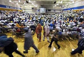 Sikhs worship at first public service at gurudwara since shooting