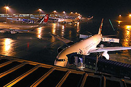 The airport experienced airport runway at night. The airport experienced