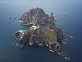 South Koreans start 230-km swim to disputed islands  