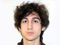 Bomb suspect is charged and will be tried in civilian court