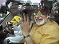 Narendra_Modi_in_car_120_41.jpg