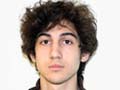 Boston bombing suspect wrote message in boat: report
