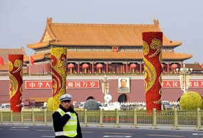 China begins transfer of power amid infighting and public spectacle