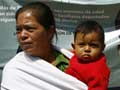 Migrants to Barack Obama: Don't deport Mama