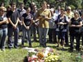 Grief turns to anger after Brazil club fire; band in custody