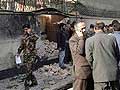 Taliban suicide attack on Afghan NATO base kills 12