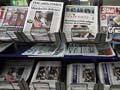 UK police arrest 3 in phone hacking investigation 