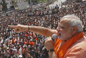 Narendra Modi is 'role model' of development, says L K Advani; BJP to release Gujarat poll manifesto today