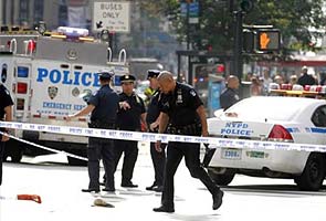 Empire State Building shooting: Gunman quiet loner, victim outgoing family man 