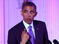 Watch how Barack Obama explains the lipstick on his collar