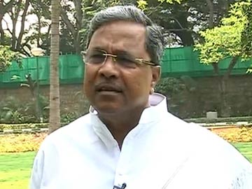 Battleground Karnataka: BJP and Congress neck-and-neck, say opinion polls Battleground Karnataka: BJP and Congress neck-and-neck, say opinion polls