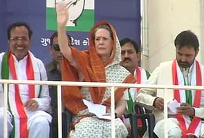 Sonia Gandhi avoids tit-for tat with Narendra Modi; defends FDI in retail