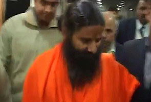 PROTESTER ATTEMPTS TO THROW BLACK INK AT BABA RAMDEV IN DELHI
