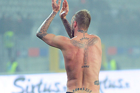Footballer David Beckham has added another tattoo, a black and white image 