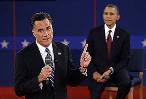 Anger flares as Barack Obama and Mitt Romney clash in second debate 