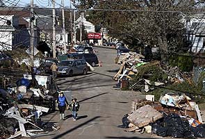 Northeast US cleans up from Superstorm Sandy, death toll rises