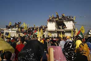 Fatah rally in Gaza looks toward unity with Hamas 