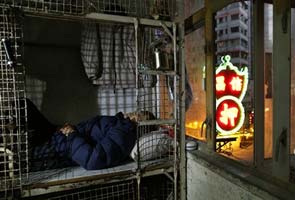 In wealthy Hong Kong, the poorest live in metal cages