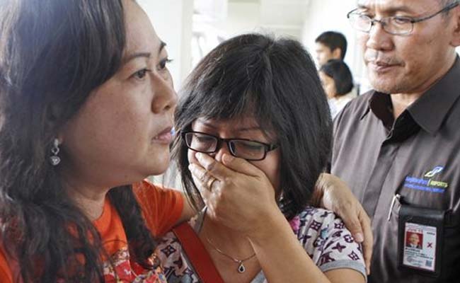 AirAsia Victim With Life Jacket Raises Questions About Planes.