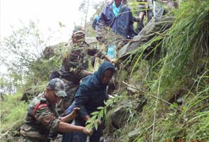 Uttarakhand: helicopters battle rain, thousands stuck in Badrinath