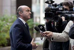 Euro officials reach deal to reduce Greek debt