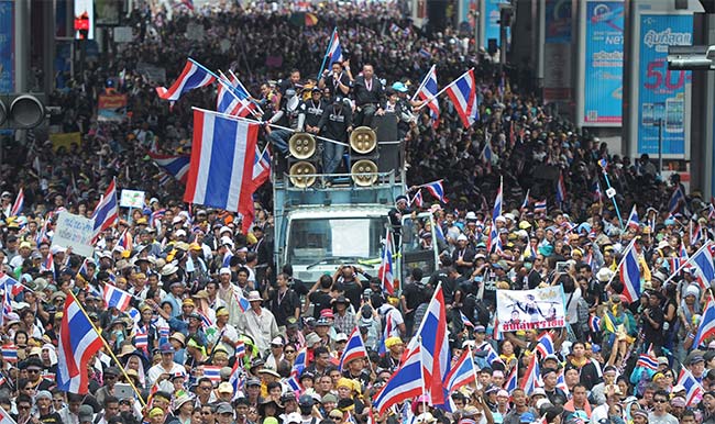 Thai PM invokes emergency law around Bangkok as protesters seize ministry offices