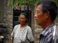 Brother of blind Chinese activist says he was beaten up