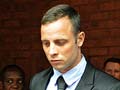 South African police took photos of Oscar Pistorius on cellphones