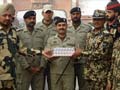 Indian, Pakistani guards exchange Diwali sweets