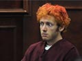 Background check was run before Colorado shootings: School