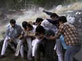 Cops use water cannons on BJP protesters outside Railways Minister Pawan Kumar Bansal's residence
