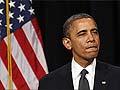Schools reopen in Newtown, Washington talks gun control