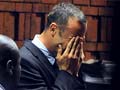 Sobbing Oscar Pistorius accused of 'premeditated' girlfriend murder