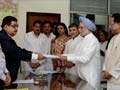 Prime Minister Manmohan Singh files Rajya Sabha nomination papers amid protests