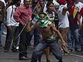 Venezuela accuses opposition of plotting coup, seven dead