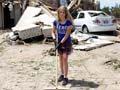 US tornado survivors begin rebuilding their lives