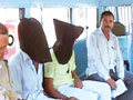 Three men tie up man, allegedly rape wife