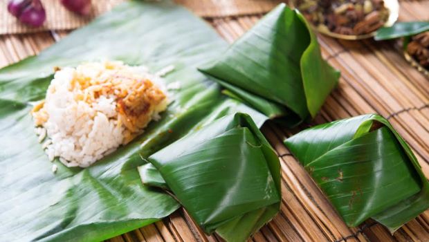 Whole fish cooked in a banana leaf with mango chutney recipe - BBC Food