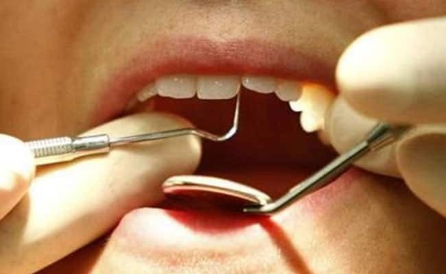 Rinse your mouth with fluoride mouthwash to kill plaque causing bacteria