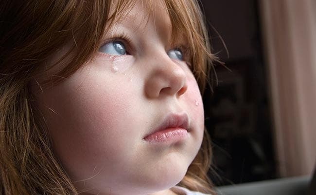 Baby-wearing can make your baby cry less