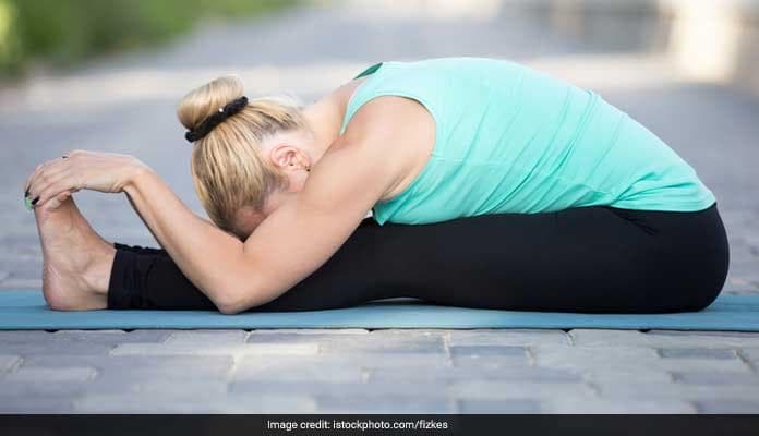 Paschimottanasana can help lower stress and boost overall health