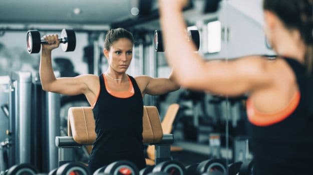 Strength training primarily works by burning calories when your body is at rest