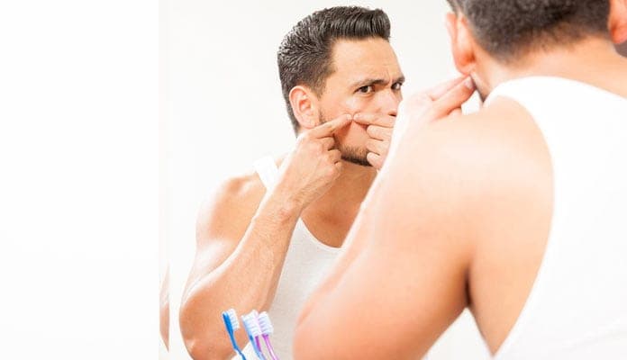 Acne may occur as a result of hormonal imbalances or clogged pores of an oily skin with bacteria growth
